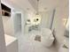 Luxurious primary bath with a freestanding tub, vanity, and marble flooring at 13400 10Th St, Dade City, FL 33525