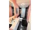 Contemporary bathroom featuring a sleek vanity, modern shower, and designer fixtures at 13400 10Th St, Dade City, FL 33525