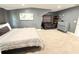 Comfortable bedroom with a soft bed and cozy sitting area at 13400 10Th St, Dade City, FL 33525