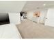 Large, open bedroom provides tons of space, access to a study area, and an airy environment at 13400 10Th St, Dade City, FL 33525