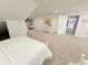 Large bedroom boasts tons of space, access to a study area, and is bright and airy at 13400 10Th St, Dade City, FL 33525