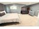 Comfortable bedroom with a soft bed and cozy sitting area at 13400 10Th St, Dade City, FL 33525