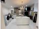 Extensive closet with ample storage, island and organization for clothes and accessories at 13400 10Th St, Dade City, FL 33525