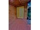 Stunning contemporary front door with glass panels, stained wood, and brushed metal handle at 13400 10Th St, Dade City, FL 33525