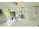 Bright home office with glass desk, ample light, and serene views at 13400 10Th St, Dade City, FL 33525