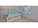 Tranquil bedroom features a stylish bed frame, soft lighting, and a serene atmosphere at 13750 Fareham Rd, Odessa, FL 33556