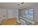 Bright dining room featuring a glass table, starfish chairs, and a view of the pool at 13750 Fareham Rd, Odessa, FL 33556