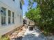 Outdoor patio with comfortable seating and a fire pit, creating a cozy space for entertaining in a backyard at 1423 Dr Martin Luther King Jr N St, St Petersburg, FL 33704