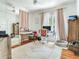Spacious bedroom featuring a large window, hardwood flooring, and great natural light at 1423 Dr Martin Luther King Jr N St, St Petersburg, FL 33704