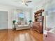 Bright living room with hardwood floors, stylish sofa, and natural light, creating a cozy and inviting space at 1423 Dr Martin Luther King Jr N St, St Petersburg, FL 33704