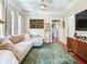 Comfortable living room with a large sectional sofa and stylish decor at 1423 Dr Martin Luther King Jr N St, St Petersburg, FL 33704