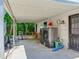 Outdoor storage area with laundry machines, utility sink, and ample space for organizing household items at 1423 Dr Martin Luther King Jr N St, St Petersburg, FL 33704
