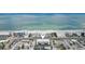 Expansive aerial view of the beach condo showcasing its stunning beachfront location at 14401 Gulf Blvd # 106, Madeira Beach, FL 33708