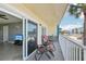 Spacious balcony with seating, perfect for enjoying the beachfront view at 14401 Gulf Blvd # 106, Madeira Beach, FL 33708