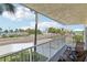 Charming balcony offers a tranquil spot with views of the ocean and beach at 14401 Gulf Blvd # 106, Madeira Beach, FL 33708