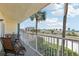 Relaxing balcony featuring comfortable seating and scenic beach views at 14401 Gulf Blvd # 106, Madeira Beach, FL 33708