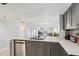 Well-equipped kitchen with modern appliances and ample counter space at 14401 Gulf Blvd # 106, Madeira Beach, FL 33708