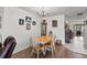 Cozy dining area with hardwood floors and a chandelier, ideal for Gathering meals and gatherings at 1633 Bentwood Dr, Sun City Center, FL 33573