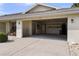 View of garage featuring painted floors, a storage area, and access to the home's interior at 1633 Bentwood Dr, Sun City Center, FL 33573
