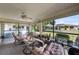 Relaxing screened lanai with comfortable seating, perfect for enjoying the outdoors at 1633 Bentwood Dr, Sun City Center, FL 33573