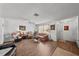 Comfortable living room with hardwood floors, natural light, and a welcoming atmosphere at 1633 Bentwood Dr, Sun City Center, FL 33573