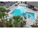 A lavish community pool has a splash pad, plentiful lounge chairs, and is kept in pristine condition at 16431 Enclave Village Dr # 16431, Tampa, FL 33647
