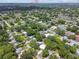 An aerial perspective showcases the neighborhood and home location, with views stretching towards the Gulf at 1817 West Dr, Clearwater, FL 33755