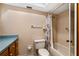 Bathroom with a vanity, toilet, and shower/tub combination at 1949 Tampa Bay Dr, Wesley Chapel, FL 33543
