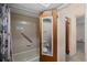 Bathroom with a vanity, toilet, and shower/tub combination at 1949 Tampa Bay Dr, Wesley Chapel, FL 33543