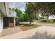 Charming home with a well-manicured front yard and mature trees providing ample shade at 1949 Tampa Bay Dr, Wesley Chapel, FL 33543