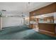 Living room with an open layout that flows into the kitchen area at 1949 Tampa Bay Dr, Wesley Chapel, FL 33543