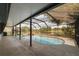 Enjoy this beautiful, caged pool with a view of a pond at 1949 Tampa Bay Dr, Wesley Chapel, FL 33543