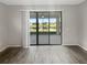 Patio features lake view, and ceiling fan at 19664 Ship Wheel Way, Land O Lakes, FL 34638