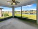 Patio featuring views of the lake and surrounding community at 19664 Ship Wheel Way, Land O Lakes, FL 34638