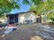 Cozy home exterior featuring a screened patio, stucco walls, and ample space at 2031 Dover Ct, Oldsmar, FL 34677