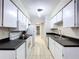 Well-lit kitchen featuring clean lines, modern appliances, and ample storage space at 2031 Dover Ct, Oldsmar, FL 34677