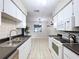 Well-equipped kitchen featuring appliances, ample counter space, and a dining area at 2031 Dover Ct, Oldsmar, FL 34677