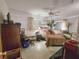 View of the bedroom with a ceiling fan and a window with curtains at 2066 High Ridge Dr, Clearwater, FL 33763