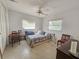 Bedroom with ceiling fan, and closet at 2066 High Ridge Dr, Clearwater, FL 33763