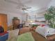 Bright bedroom featuring neutral walls, ceiling fan, and ample natural light at 2066 High Ridge Dr, Clearwater, FL 33763