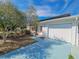 Charming home featuring a well-maintained exterior, a garage, walkway, and landscaping at 2066 High Ridge Dr, Clearwater, FL 33763
