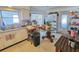Kitchen area with glass table, cabinetry and an open feel at 2066 High Ridge Dr, Clearwater, FL 33763