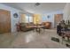 Cozy living room features carpeted floors, window and comfortable seating at 2066 High Ridge Dr, Clearwater, FL 33763