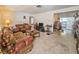 Open living room featuring couches, a coffee table, and an open floor plan at 2066 High Ridge Dr, Clearwater, FL 33763