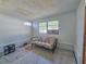 Light-filled sun room featuring tiled floor and large windows at 2066 High Ridge Dr, Clearwater, FL 33763