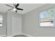 Bedroom with closet, ceiling fan, and windows at 243 45Th N St, St Petersburg, FL 33713