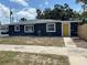 Charming home with blue exterior paint and a bright yellow front door at 243 45Th N St, St Petersburg, FL 33713