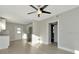 Bright, open living room with modern ceiling fan and neutral color palette at 243 45Th N St, St Petersburg, FL 33713