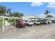 Outdoor parking area with multiple spaces available for tenants and guests at 301 Andover S Pl # 175, Sun City Center, FL 33573