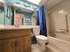Bathroom features a shower, a tub, and single-sink vanity with a large mirror and decor at 3509 Oak Lake Dr, Palm Harbor, FL 34684